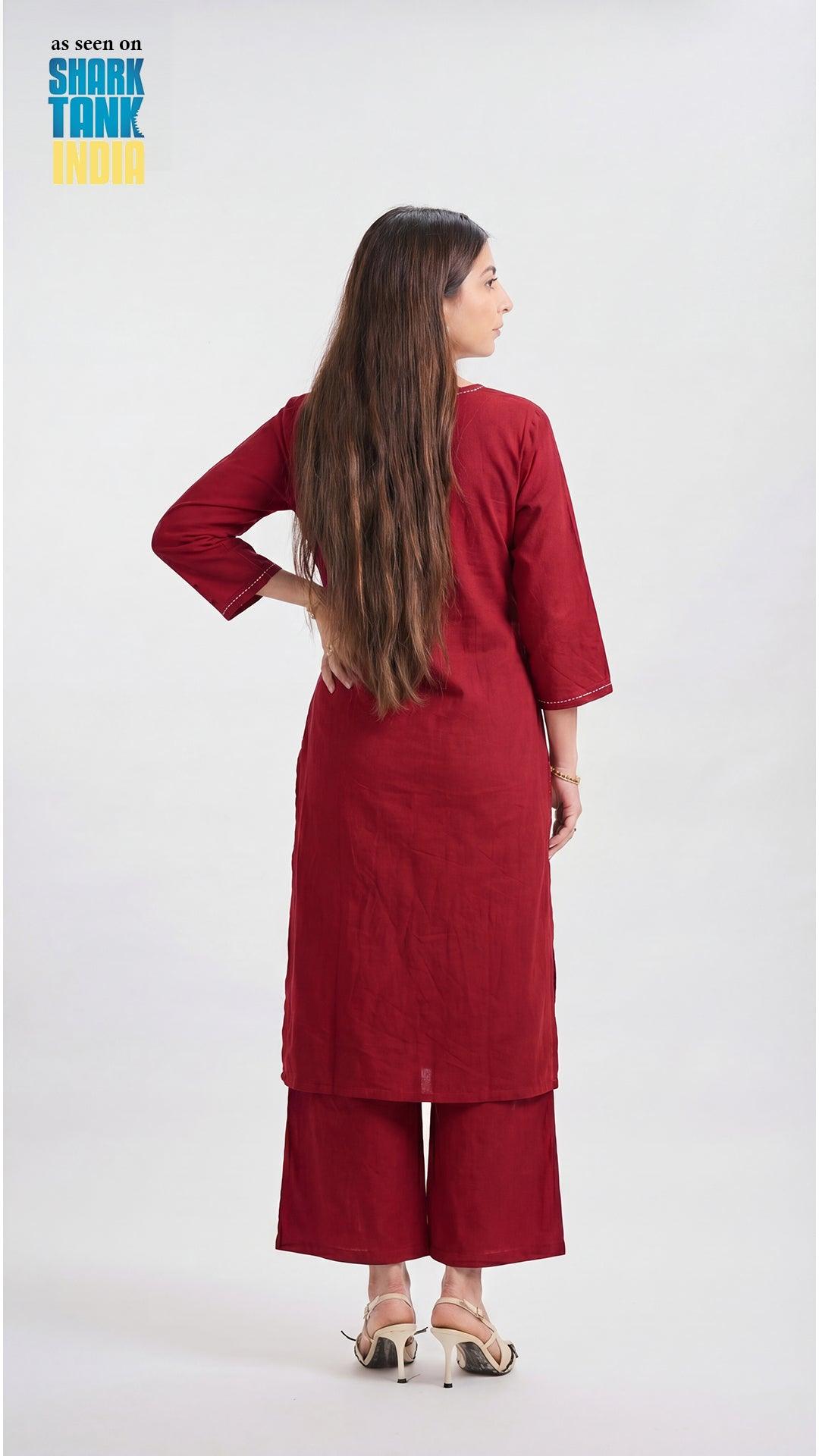 Woman wearing a red outfit with wide-leg pants on a white background, featuring 'Shark Tank India' branding.
