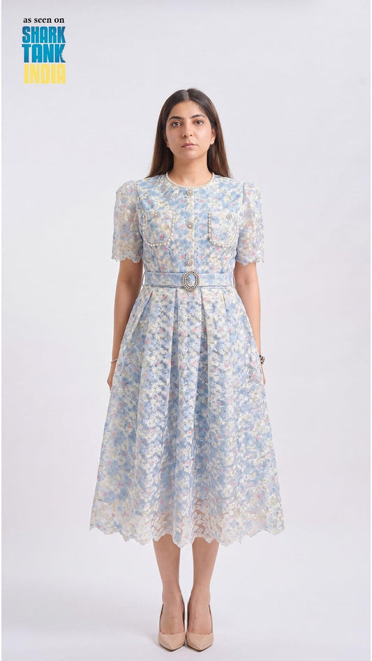 Woman wearing a floral dress on a white background