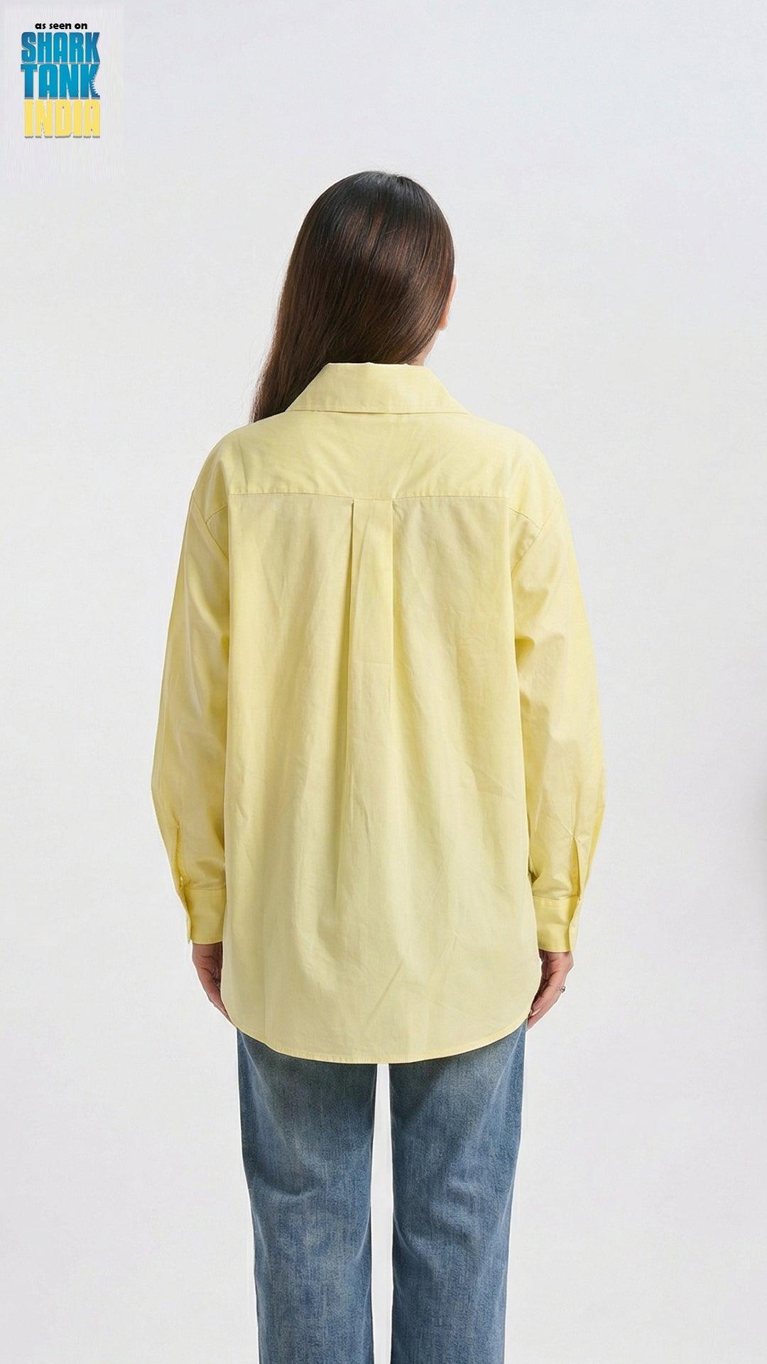Person wearing a yellow shirt and blue jeans on a white background