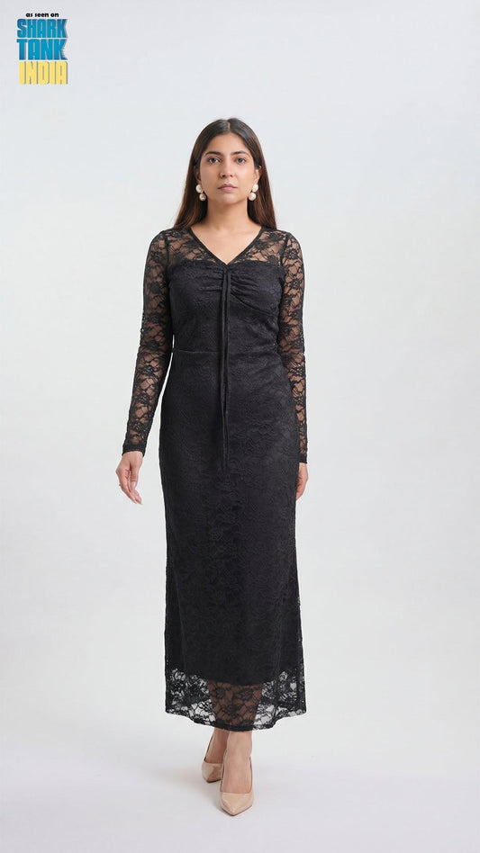 Woman wearing a black lace dress on a white background