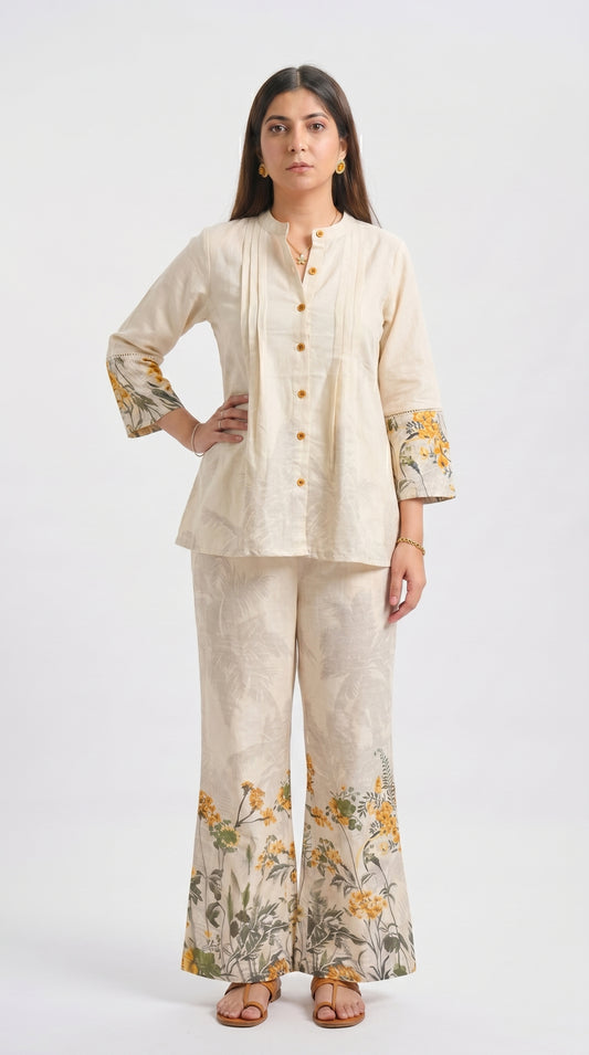 Woman wearing a traditional outfit with floral patterns on a white background