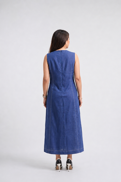 Woman wearing a blue dress on a white background