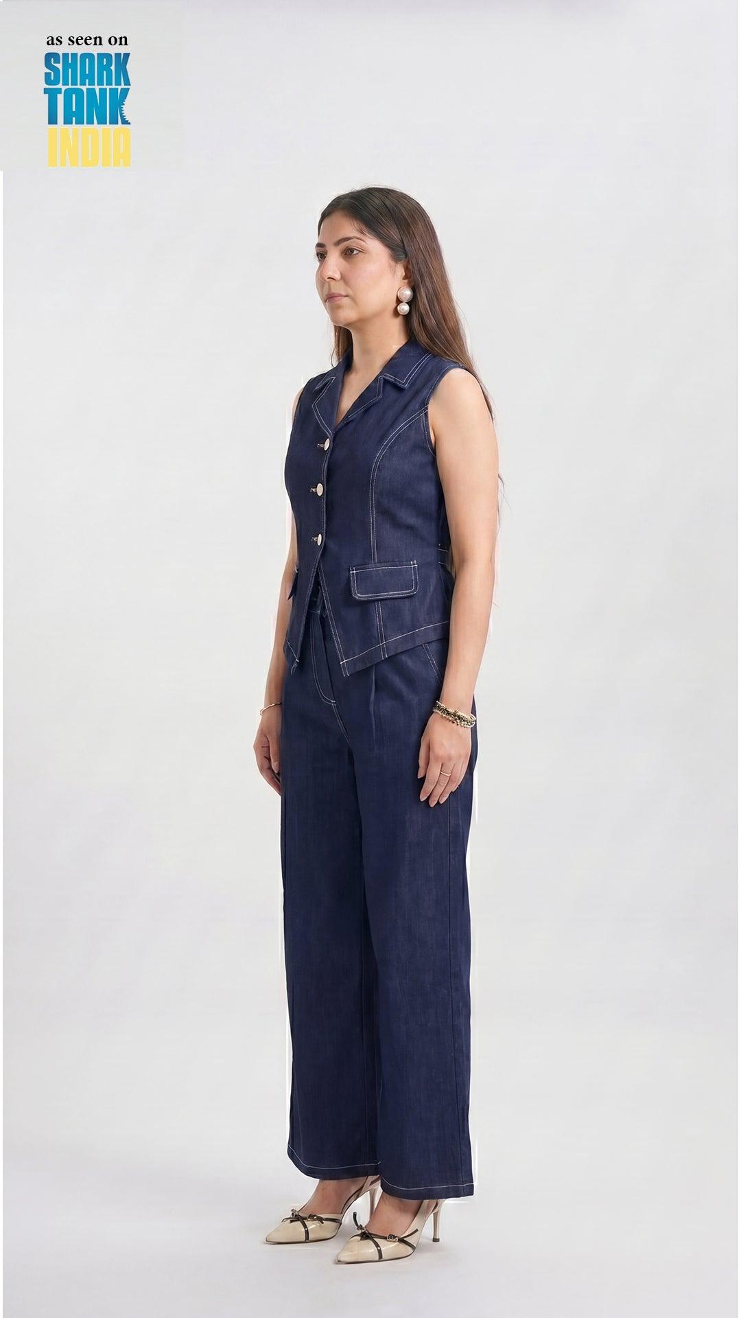 Woman wearing a denim outfit on a white background with 'Shark Tank India' branding.