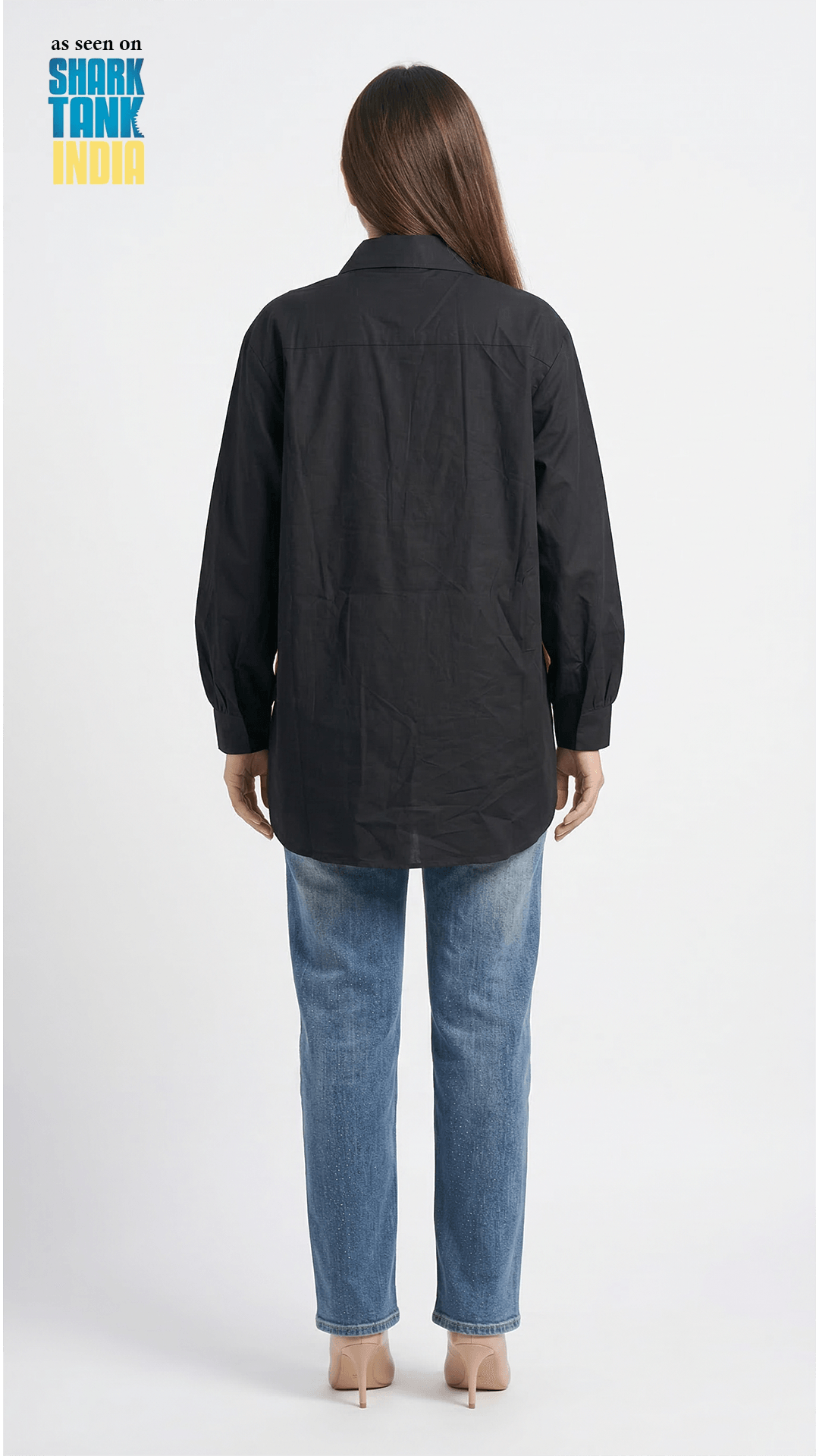 Person wearing a black jacket and blue jeans on a white background with 'Shark Tank' branding.