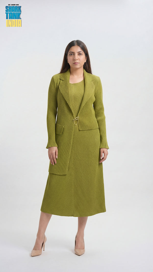 Woman wearing a green suit with a white background