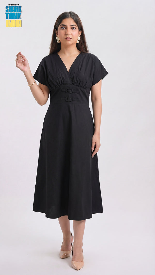 Woman wearing a black dress on a white background