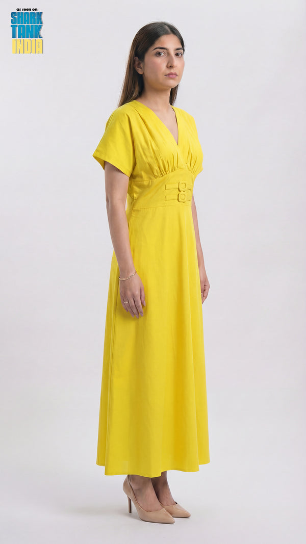 Woman wearing a yellow dress on a white background