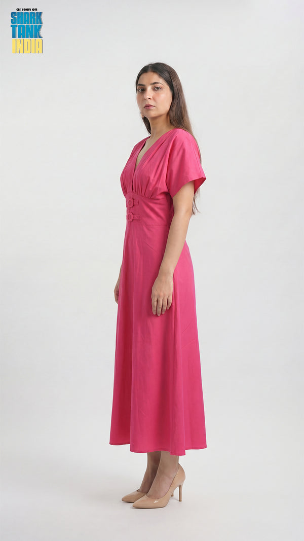 Woman wearing a pink dress on a white background