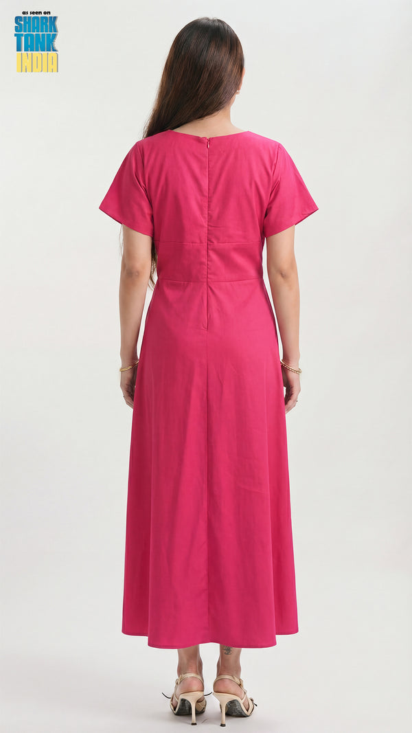 Woman wearing a pink dress from behind on a white background