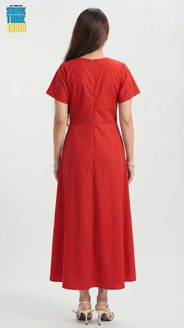 Red dress worn by a person on a white background