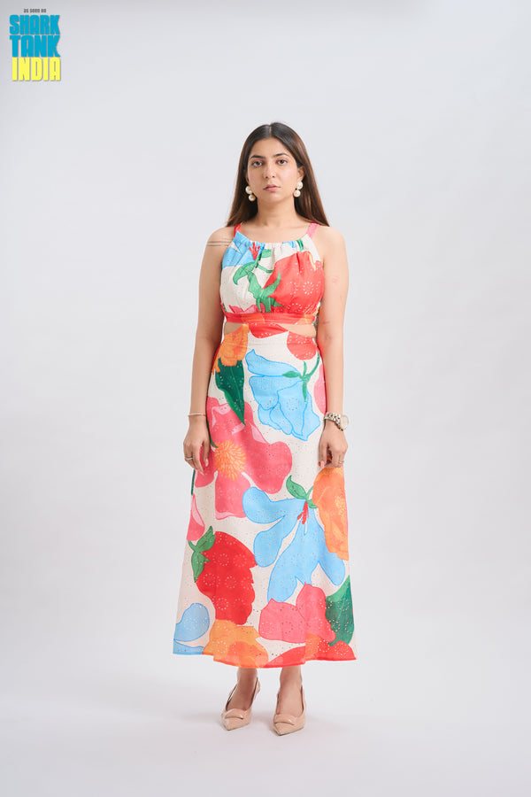 Woman wearing a colorful floral dress on a white background