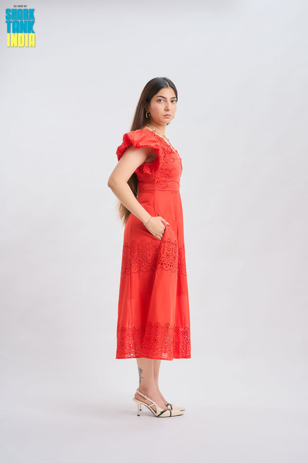 Woman wearing a red dress on a white background