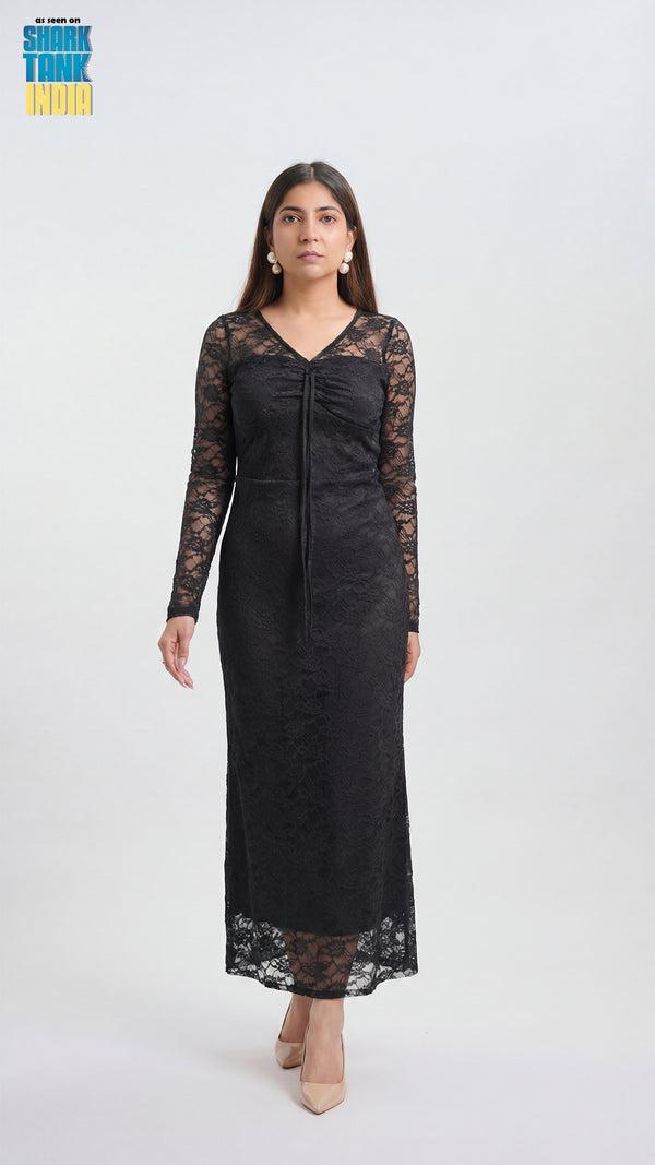 Woman wearing a black lace dress on a white background