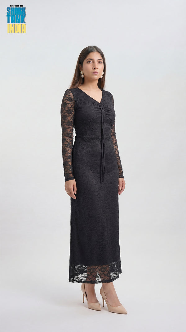 Woman wearing a black lace dress on a white background