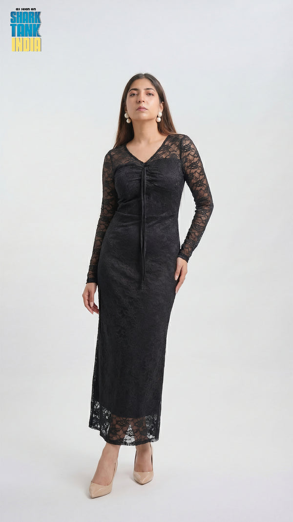 Woman wearing a black lace dress on a white background