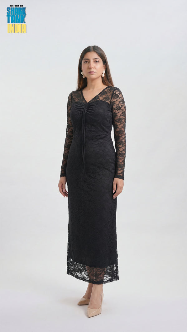 Woman wearing a black lace dress on a white background