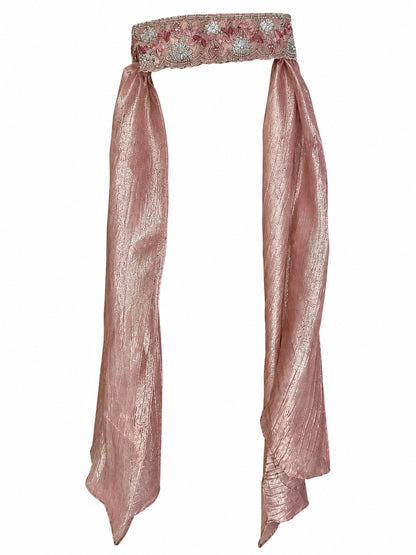 A metallic rose gold fabric waist scarf with a decorative embroidered band at the top, displayed against a solid white background.