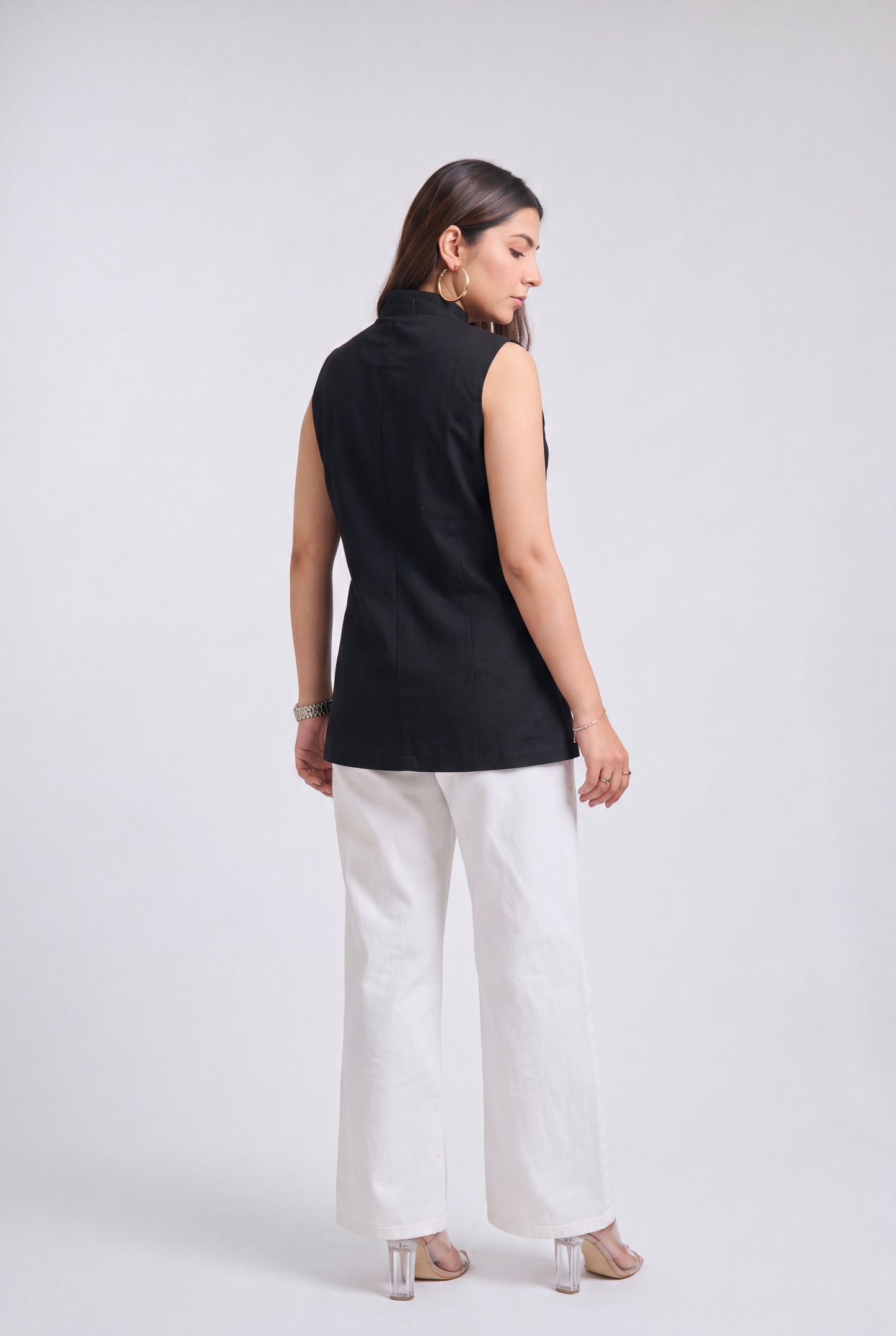 Tbfo Nepolian Top in black with military-inspired metallic button detailing and high stand collar
