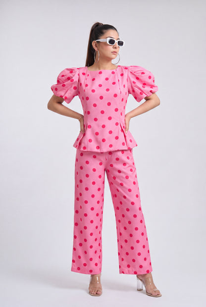 Tbfo Pink Sandwich Coord Set featuring a pink polka dot puff-sleeve top with matching wide-leg pants.