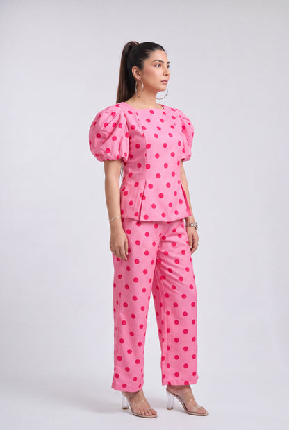 Tbfo Pink Sandwich Coord Set featuring a pink polka dot puff-sleeve top with matching wide-leg pants.