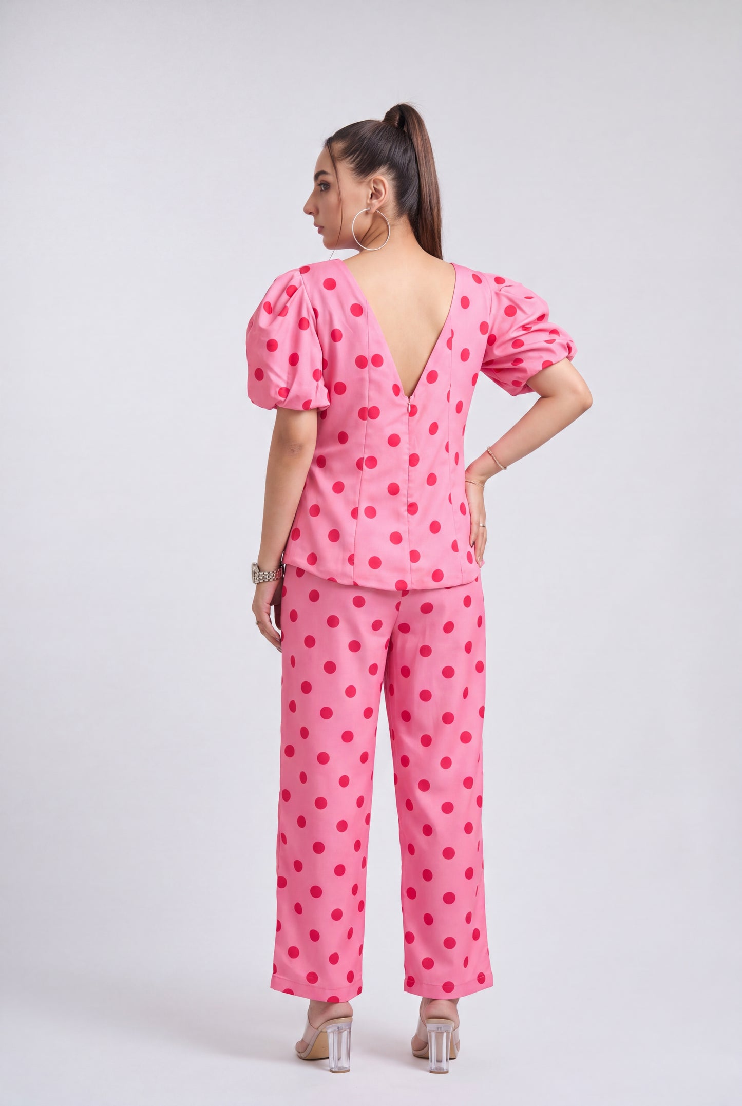 Tbfo Pink Sandwich Coord Set featuring a pink polka dot puff-sleeve top with matching wide-leg pants.