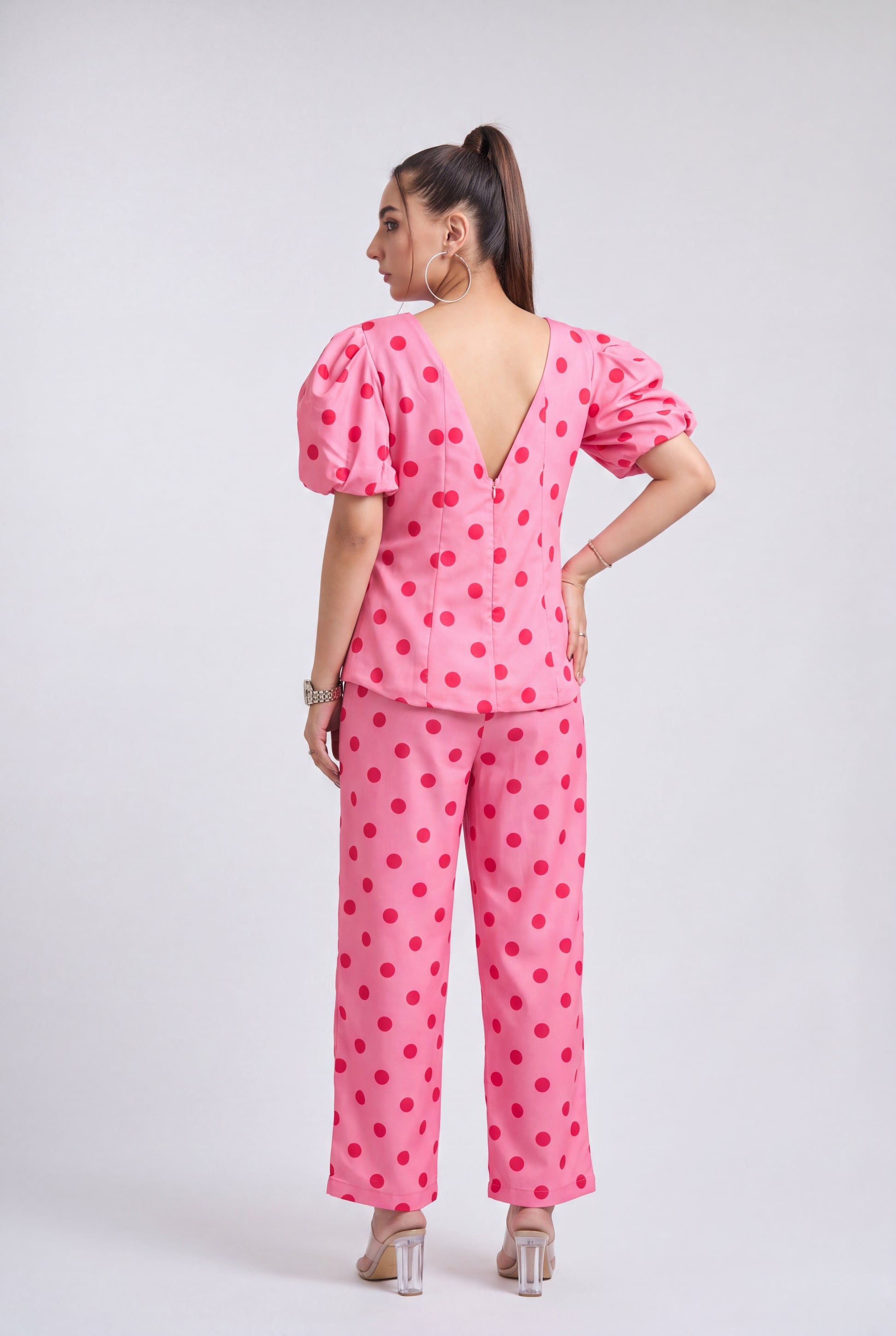 Tbfo Pink Sandwich Coord Set featuring a pink polka dot puff-sleeve top with matching wide-leg pants.