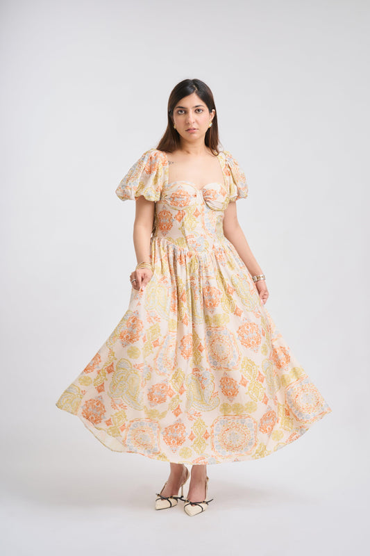 Woman wearing a floral dress on a white background