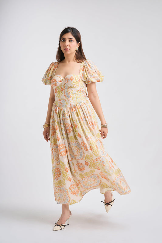Woman wearing a floral dress on a white background