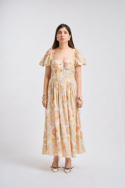 Woman wearing a floral dress on a white background