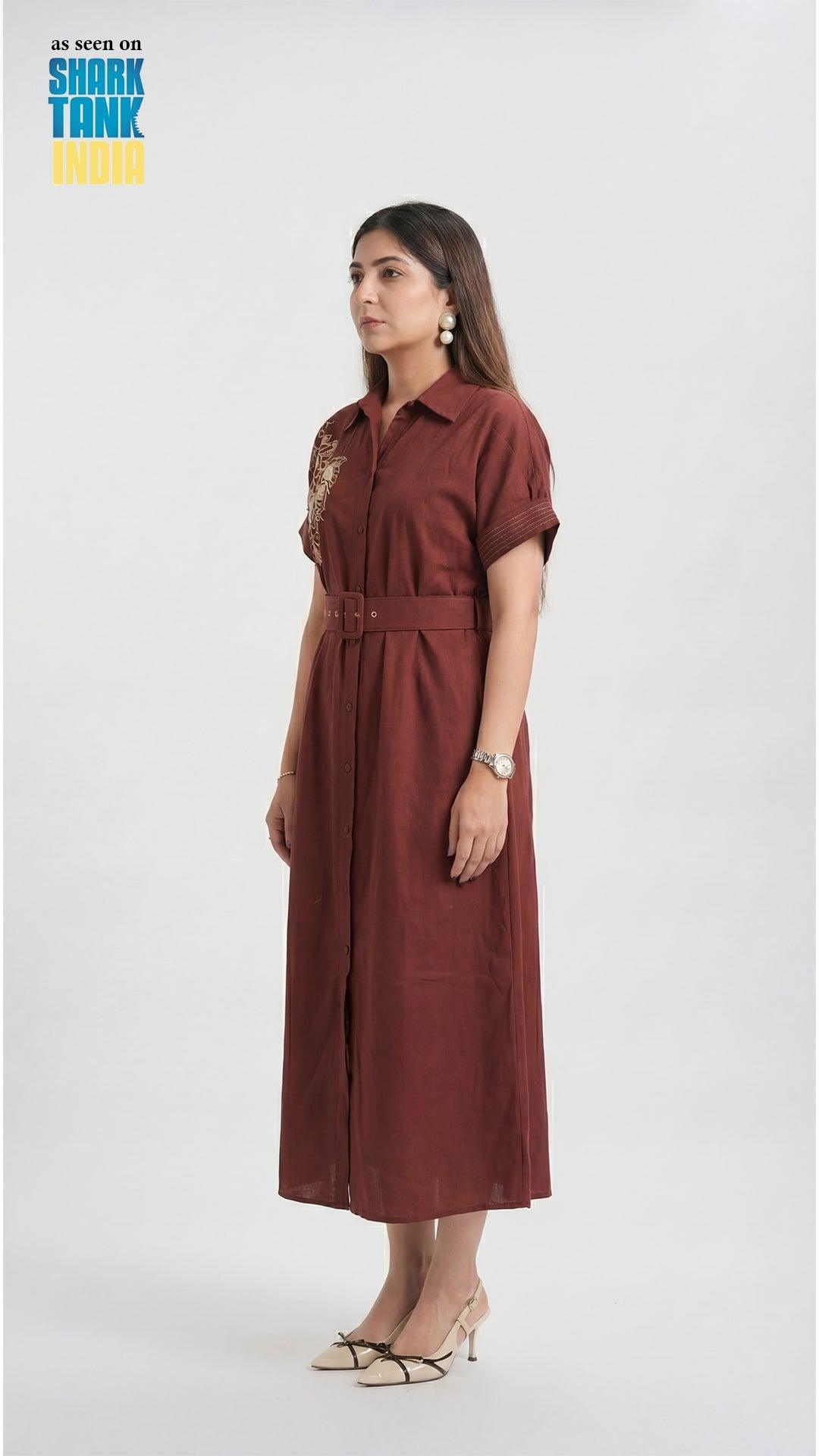 Woman wearing a brown dress with a belt on a white background