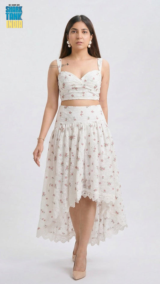 Woman wearing a white floral dress on a white background