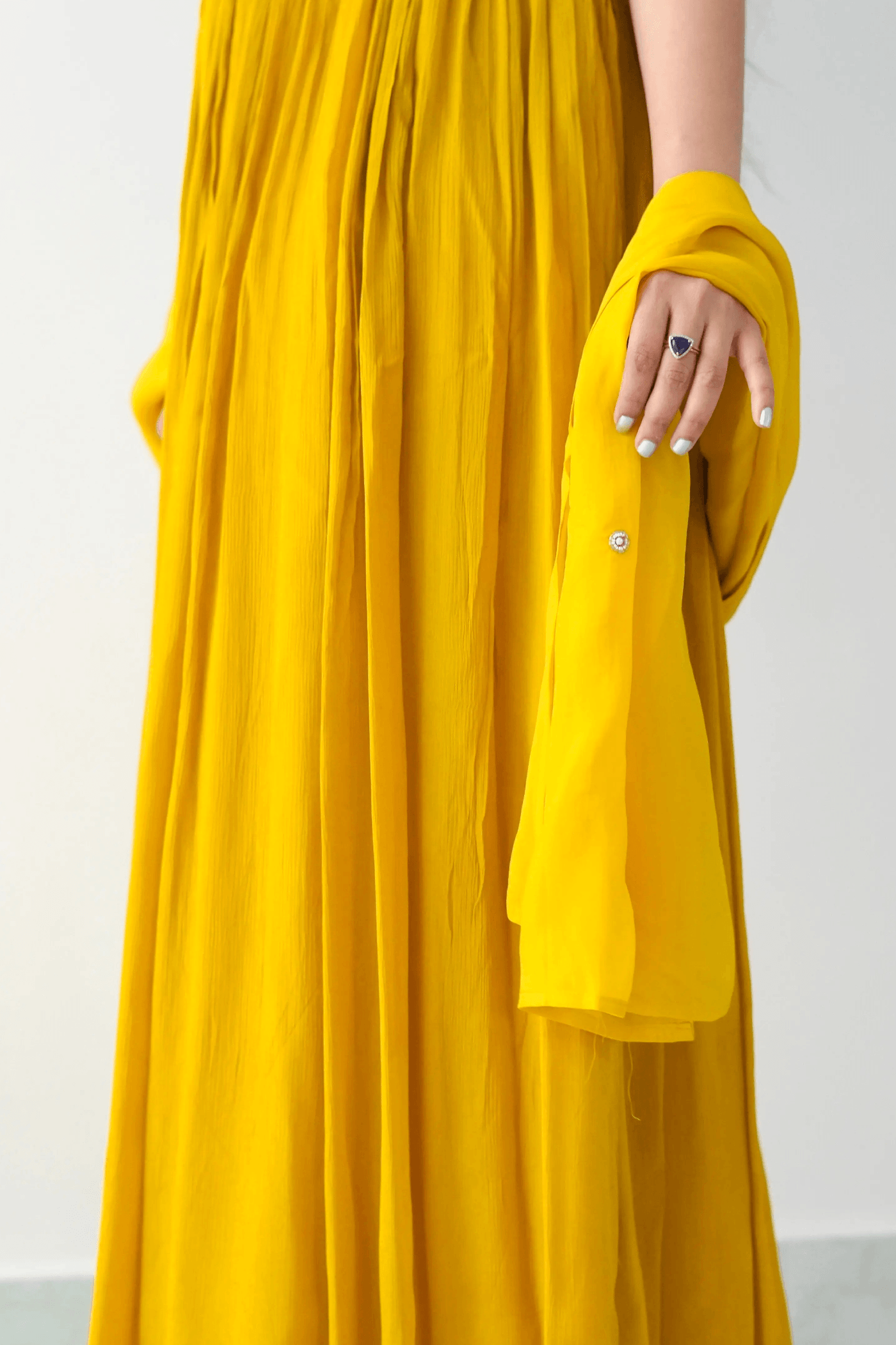 Yellow dress with a plain background