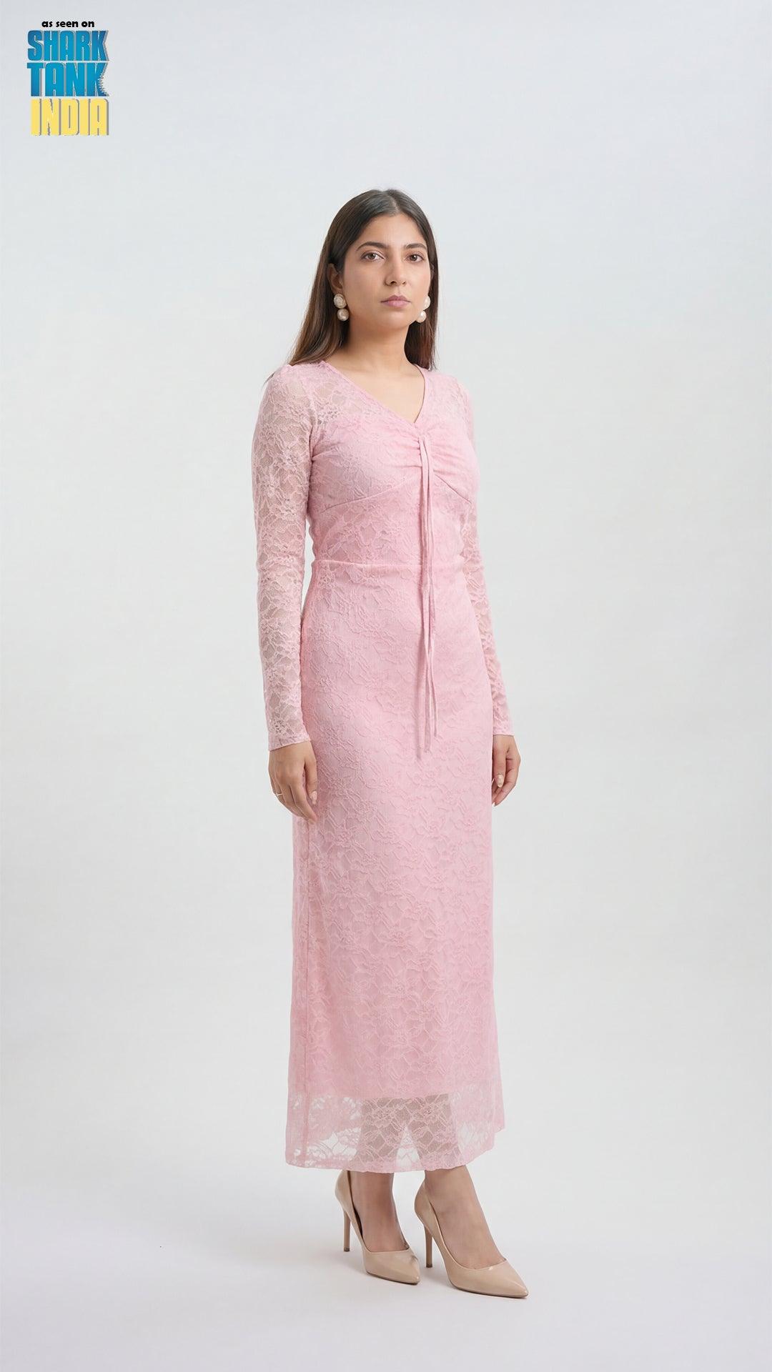 Woman wearing a pink dress on a white background