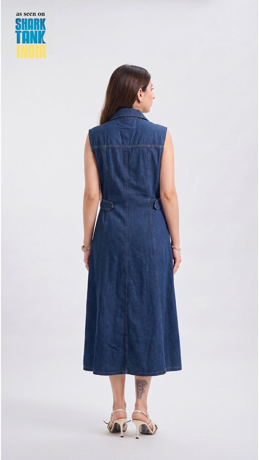 Woman wearing a blue denim dress on a white background with 'Shark Tank' branding.