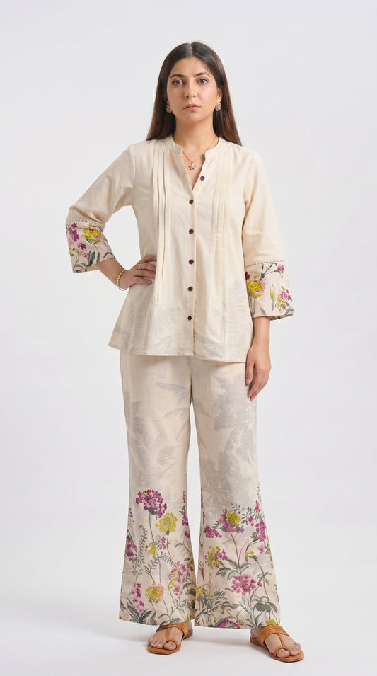 Woman wearing a floral outfit on a white background