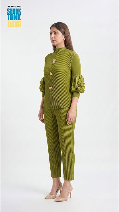 Woman wearing a green outfit with a white background