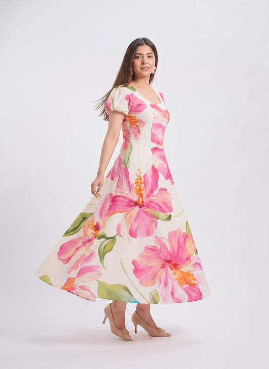 TBFO floral print maxi dress with puff sleeves and scoop neckline worn by a model in a studio setting