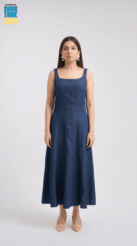Woman wearing a blue dress on a white background