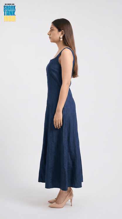 Woman wearing a navy blue dress on a white background
