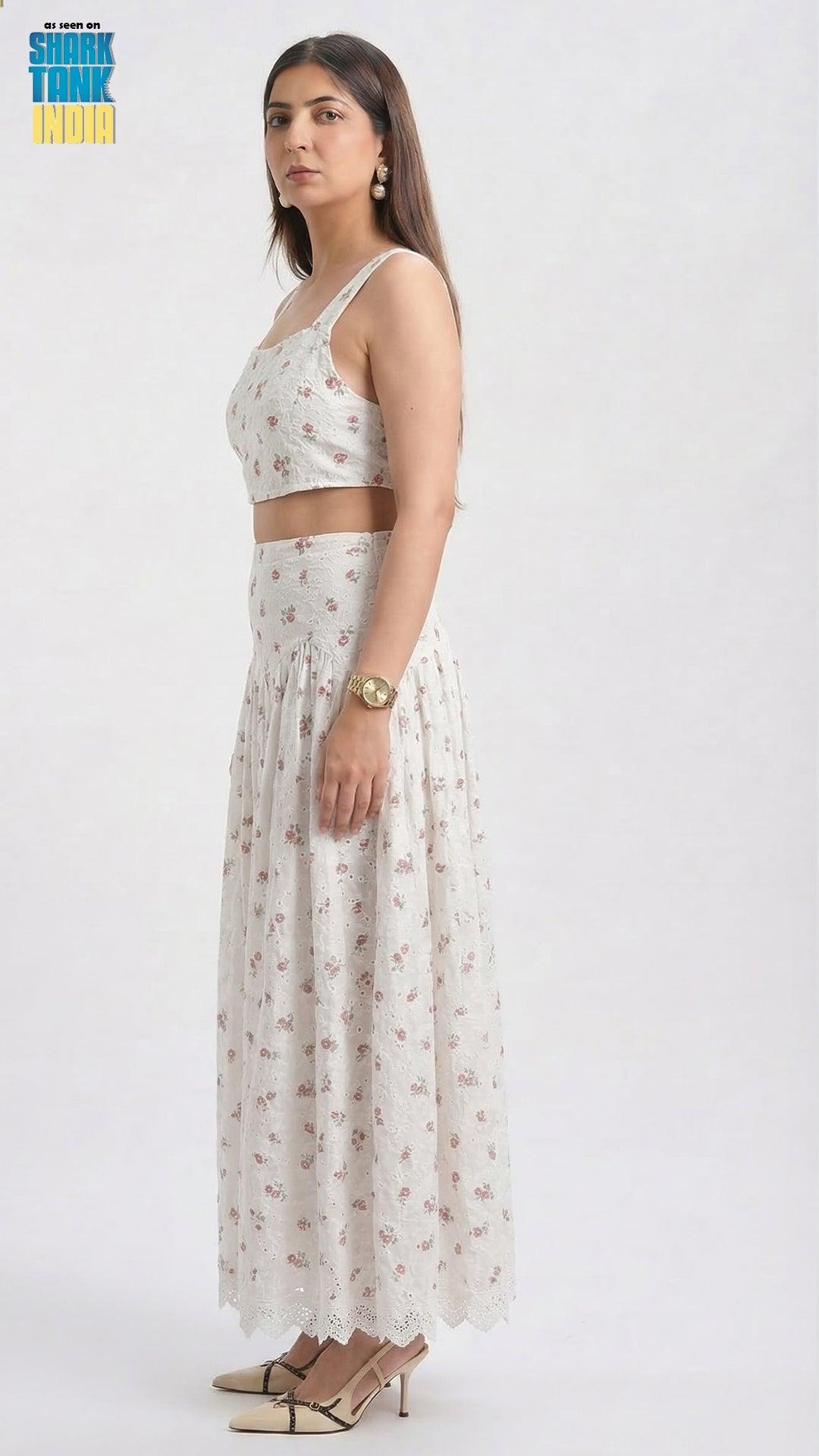 Woman wearing a floral dress with a white background