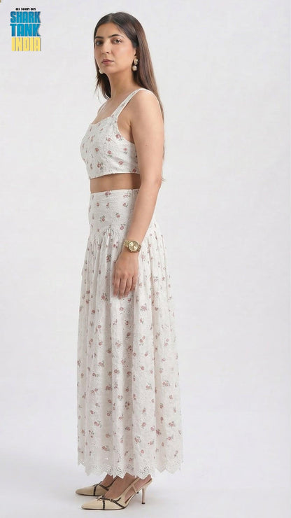 Woman wearing a floral dress with a white background