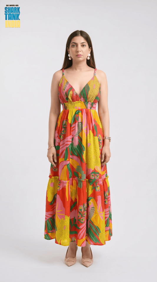 Woman wearing a colorful floral dress on a white background