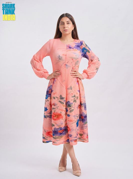 Woman wearing a floral dress on a white background with 'Shark Tank India' branding.