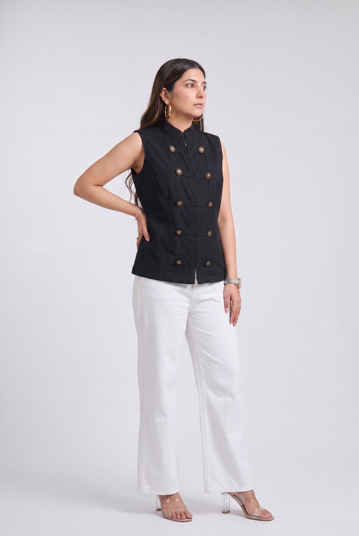 Tbfo Nepolian Top in black with military-inspired metallic button detailing and high stand collar