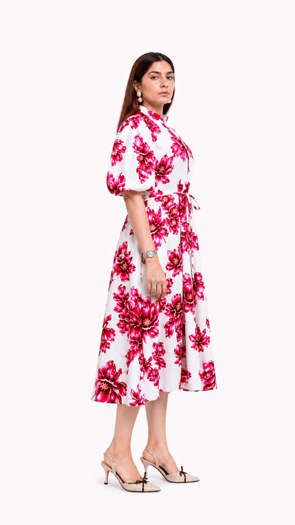 Woman wearing a floral dress on a white background