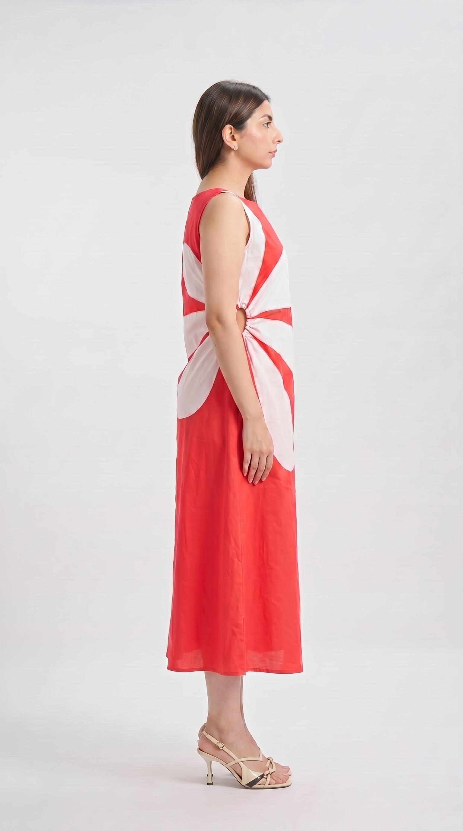 Woman wearing a red and white sleeveless dress on a white background