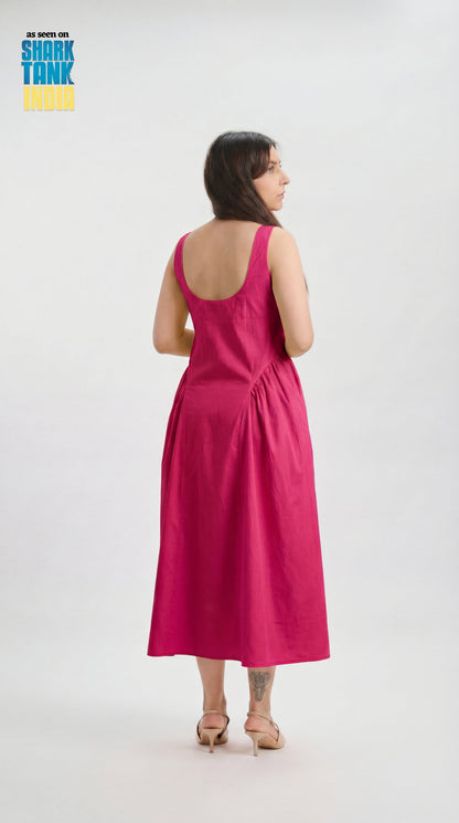 Woman wearing a pink dress on a white background with 'Shark Tank' branding.