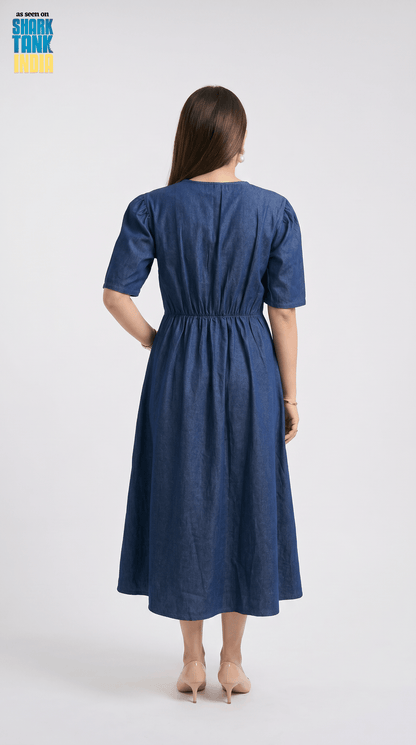 Woman wearing a blue dress on a white background