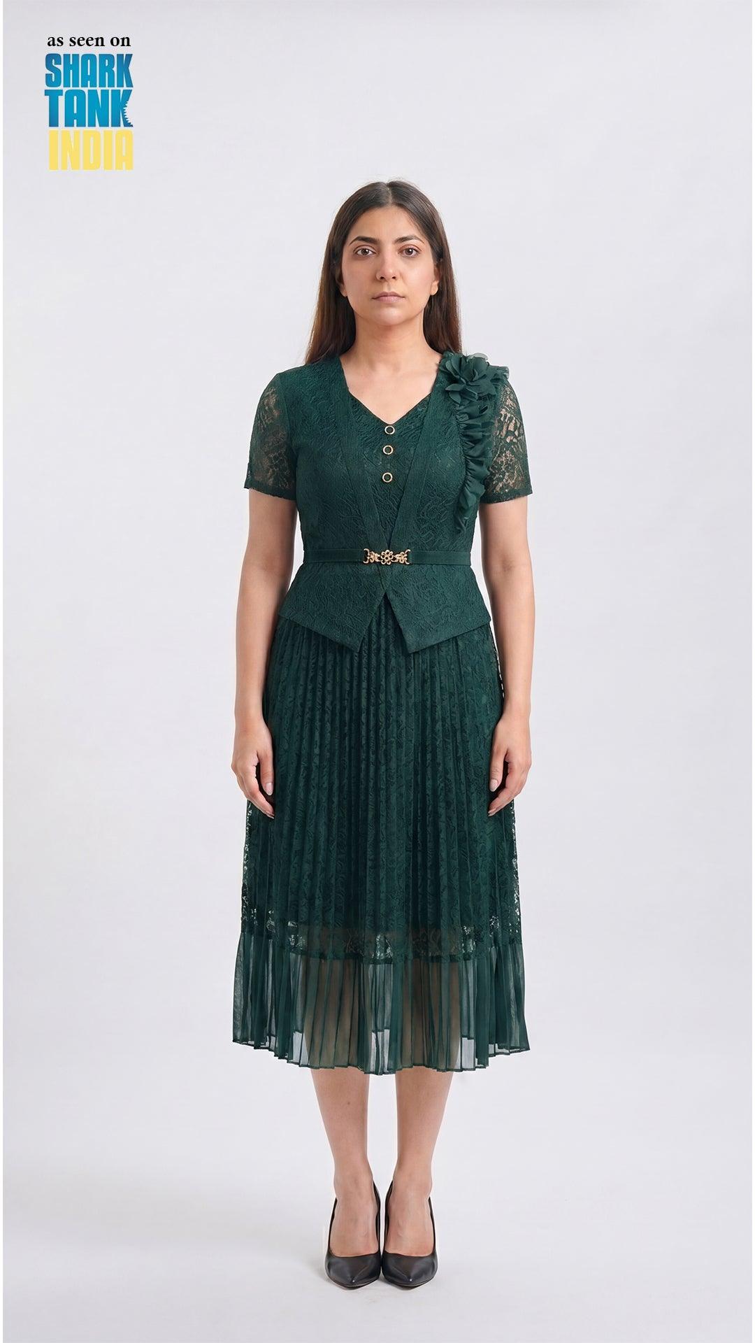 Woman wearing a green dress with lace details on a white background