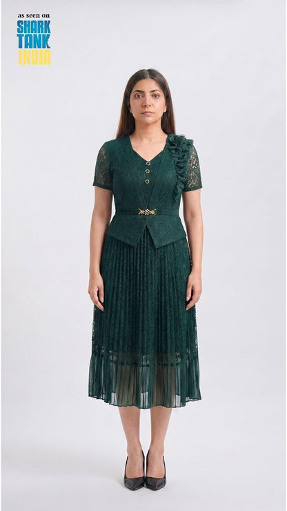 Woman wearing a green dress with lace details on a white background